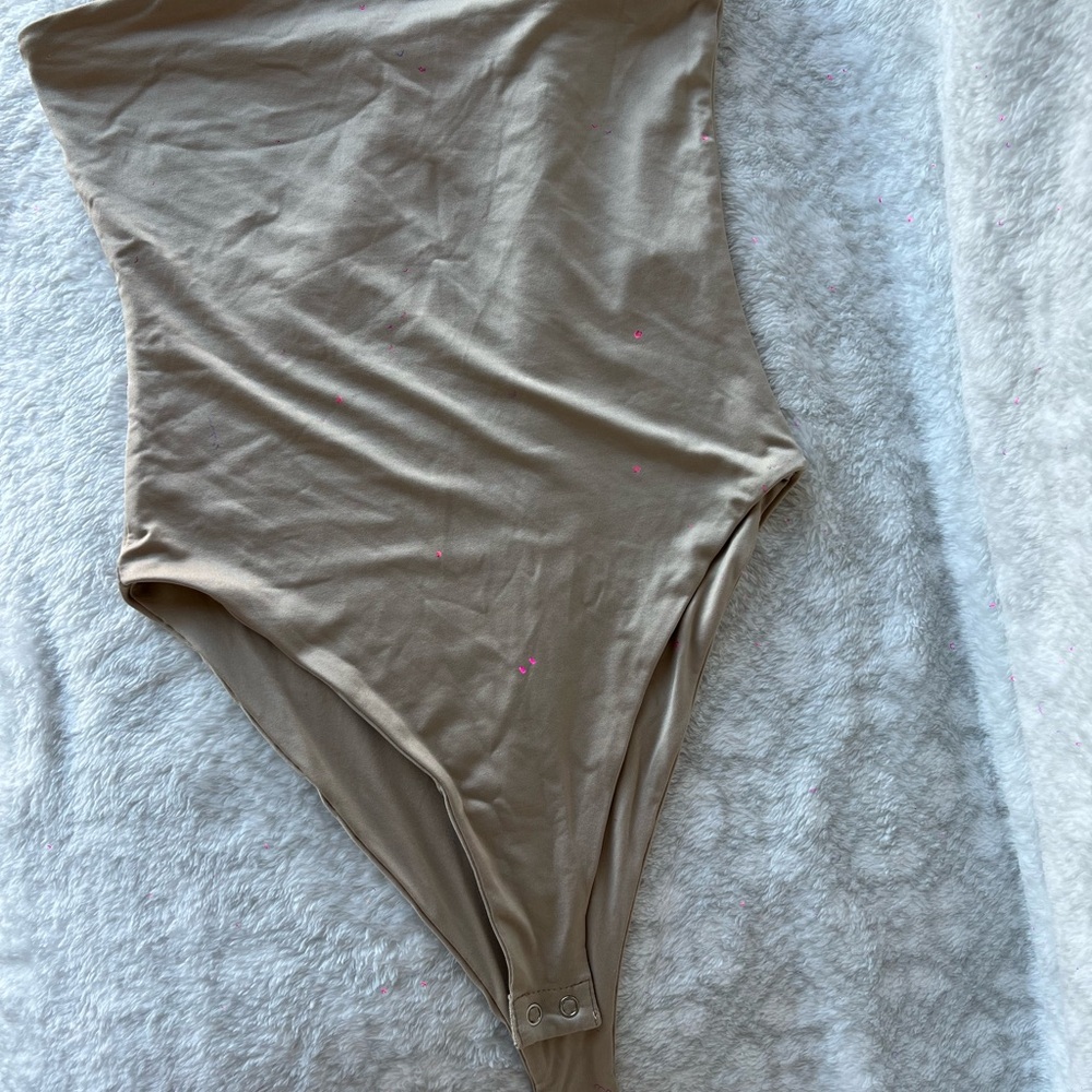 Tan Shapewear Bodysuit with High-Cut Leg Opening and Form-Fitting Design